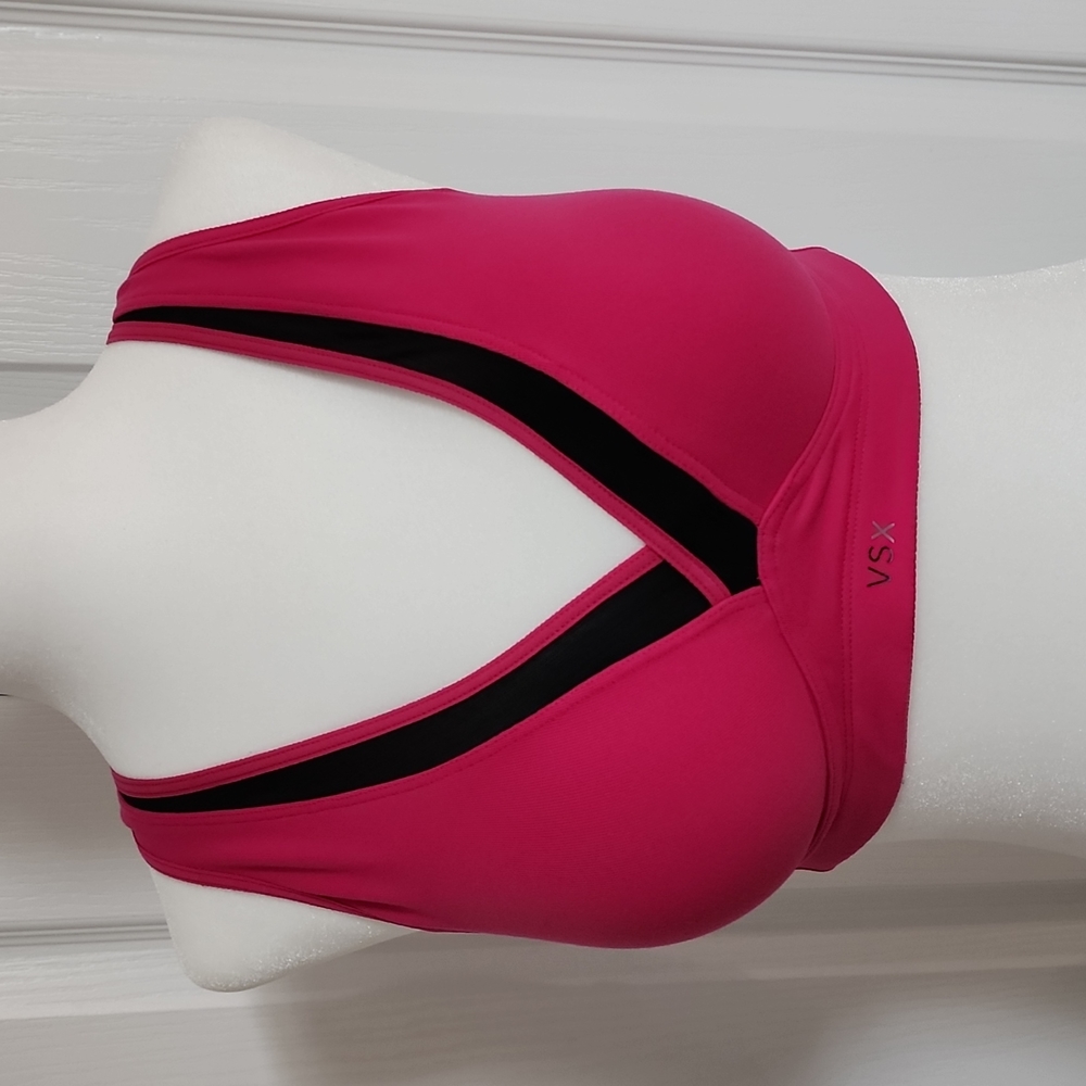 Victoria's Secret padded sports bra. Pink with black mesh. 34C.
